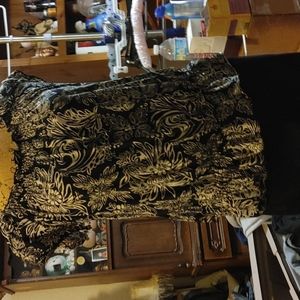 Black pants with black and white top